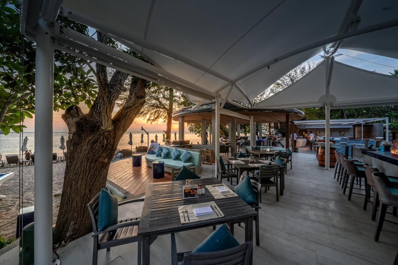 Centara Grand Beach Resort & Villas Krabi Ao Nang Exterior photo Sunset at the beach bar